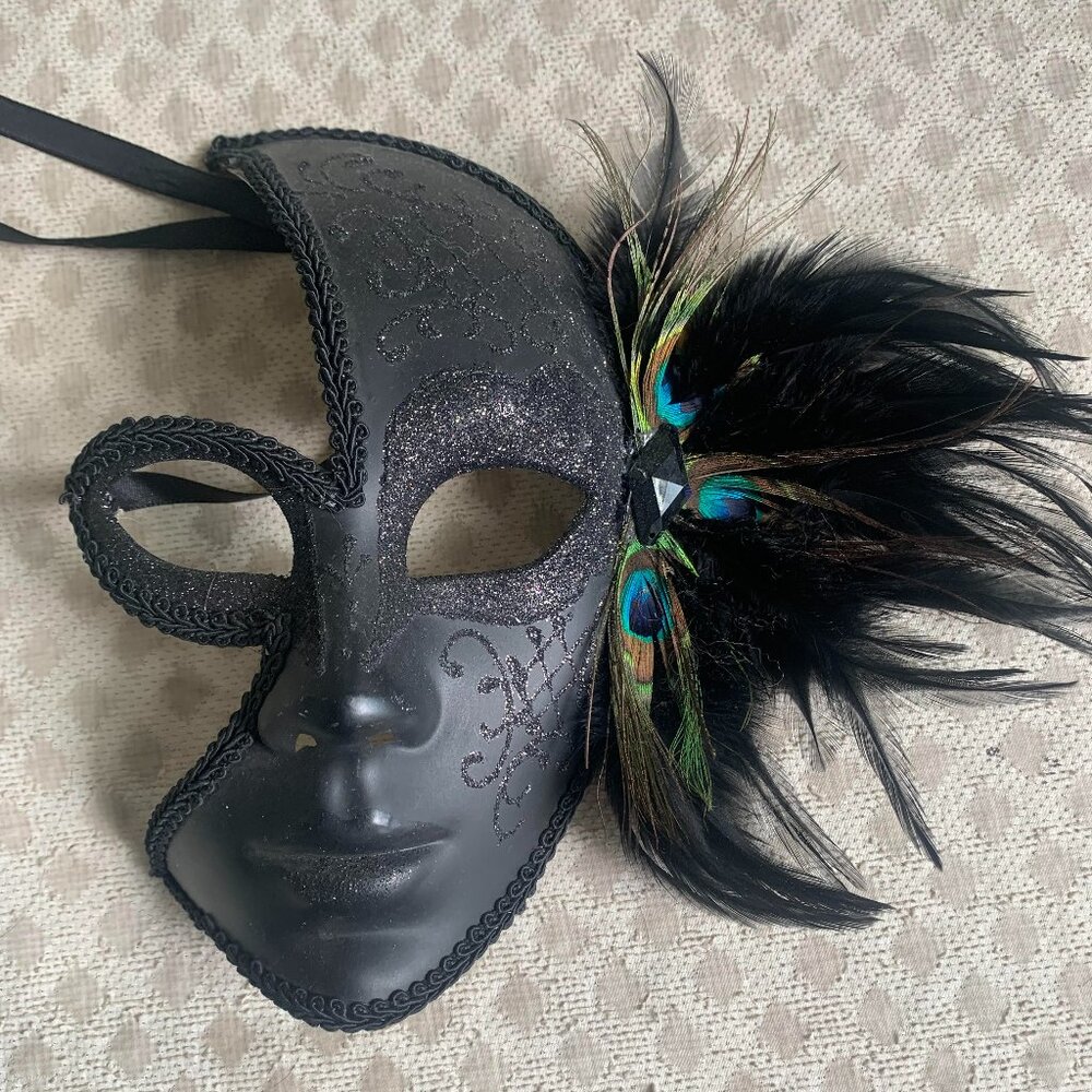 Brand new elegant black masquerade mask from New Orleans with feather details